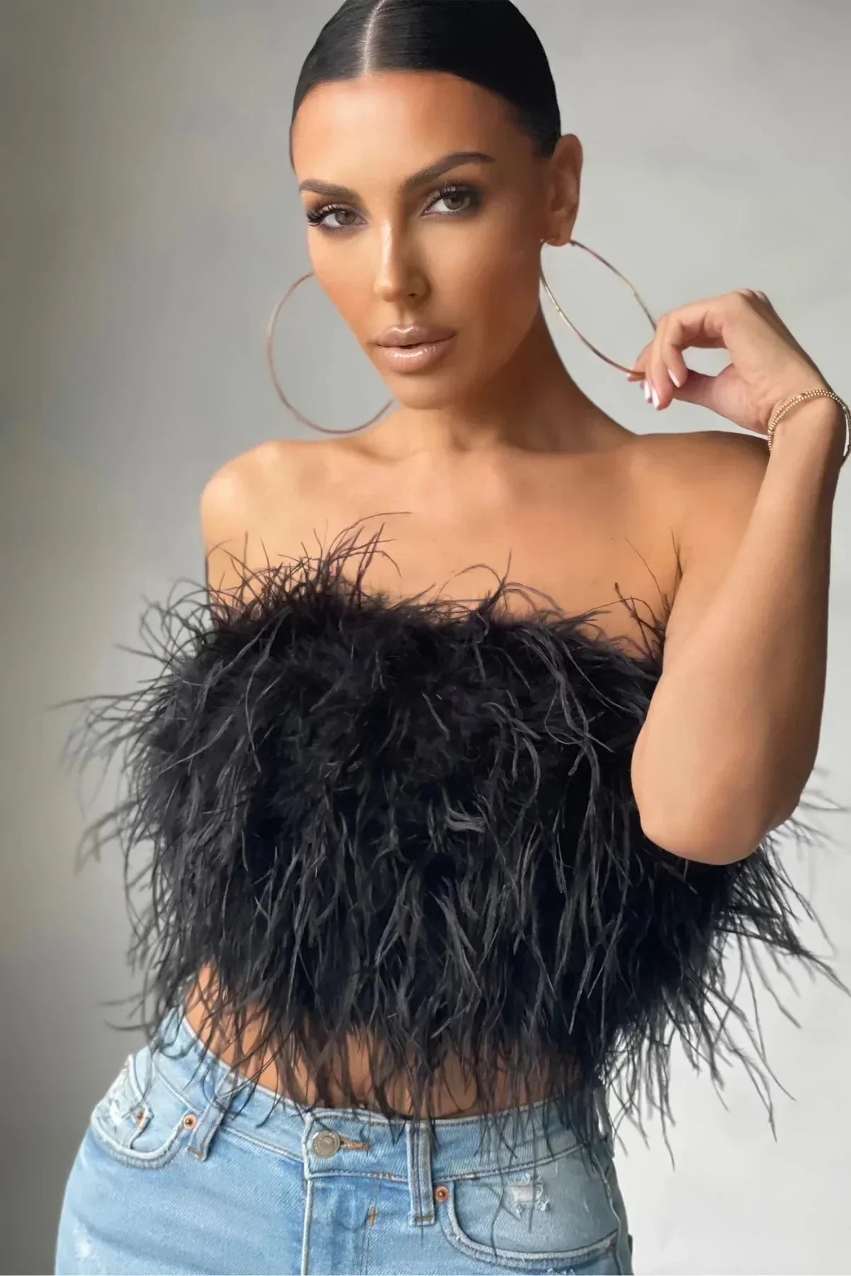 Damen-Crop-Top mit Federdetail – Elegant und trendy für Partys