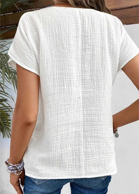 Damenbluse mit Struktur und Knopfleiste