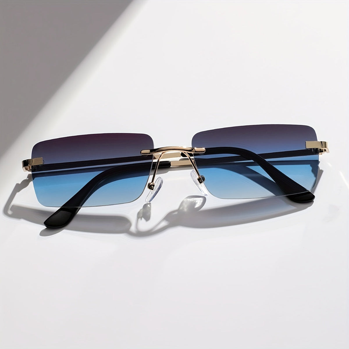 Herren-Sonnenbrille mit UV-Schutz und leichtem Metallgestell – rahmenlose Konstruktion