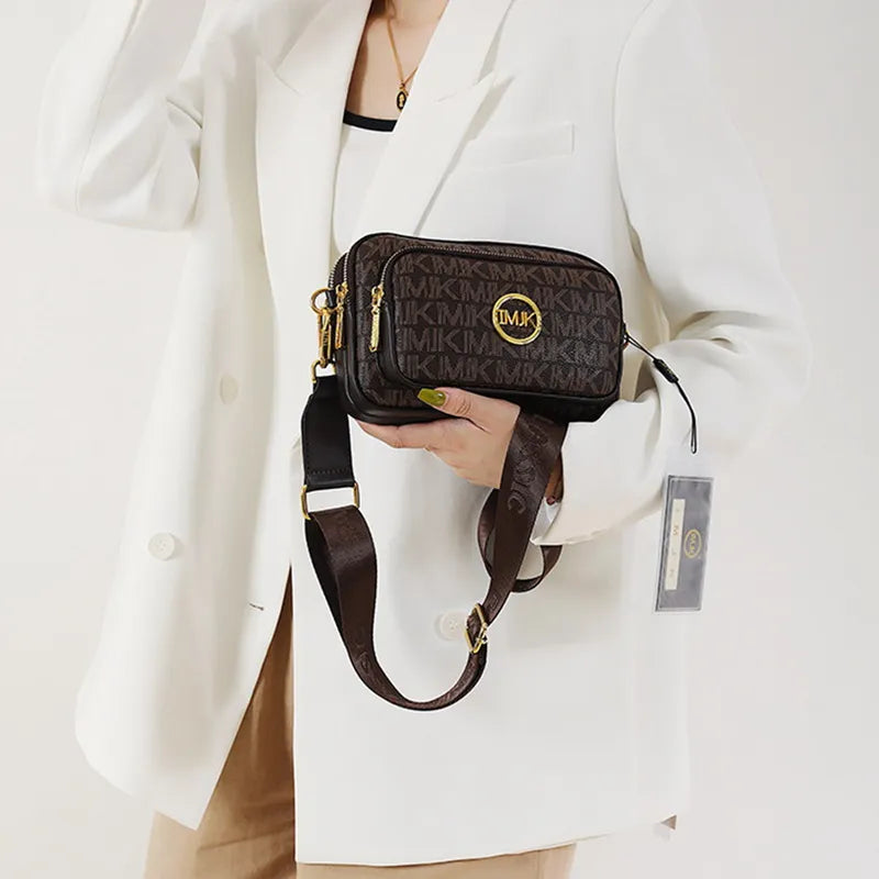Damen-Schultertasche mit Monogramm und Kettendetail
