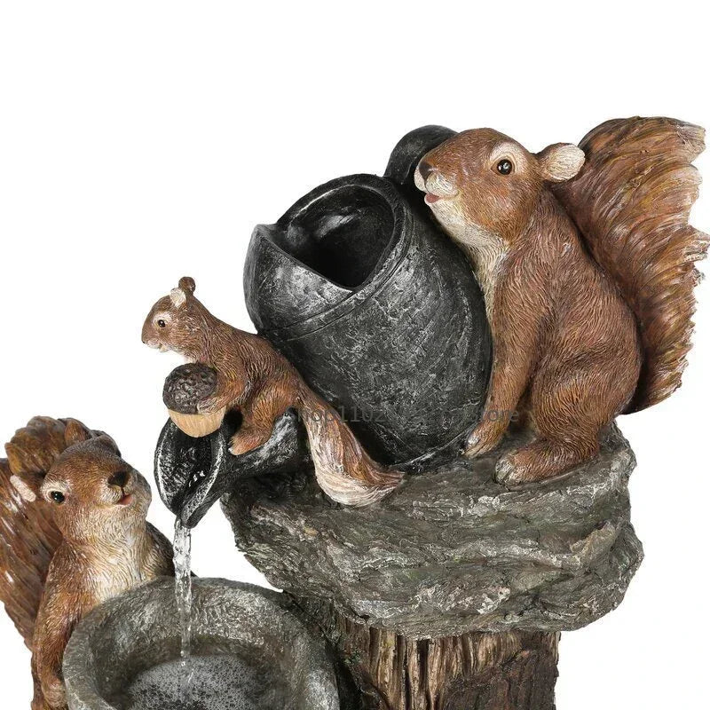 Dekorativer Solarbrunnen Ente & Eichhörnchen | Gartenfigur mit LED-Beleuchtung | Wetterfestes Kunstharz | Für Terrasse & Balkon