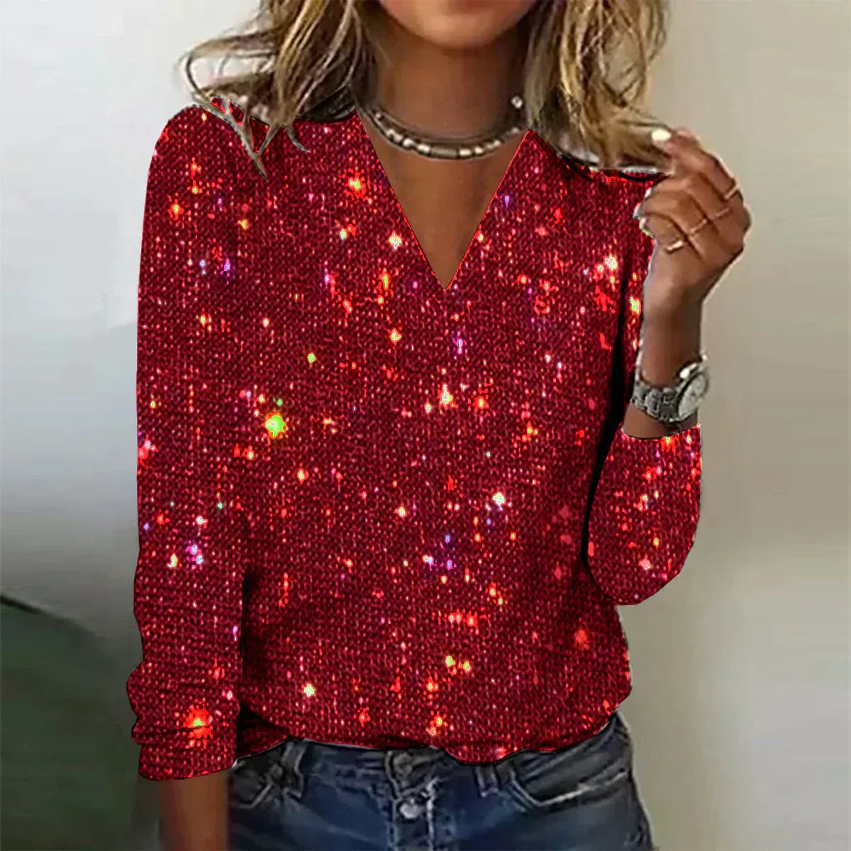 Funkelnder Pullover mit V-Ausschnitt für den Herbst