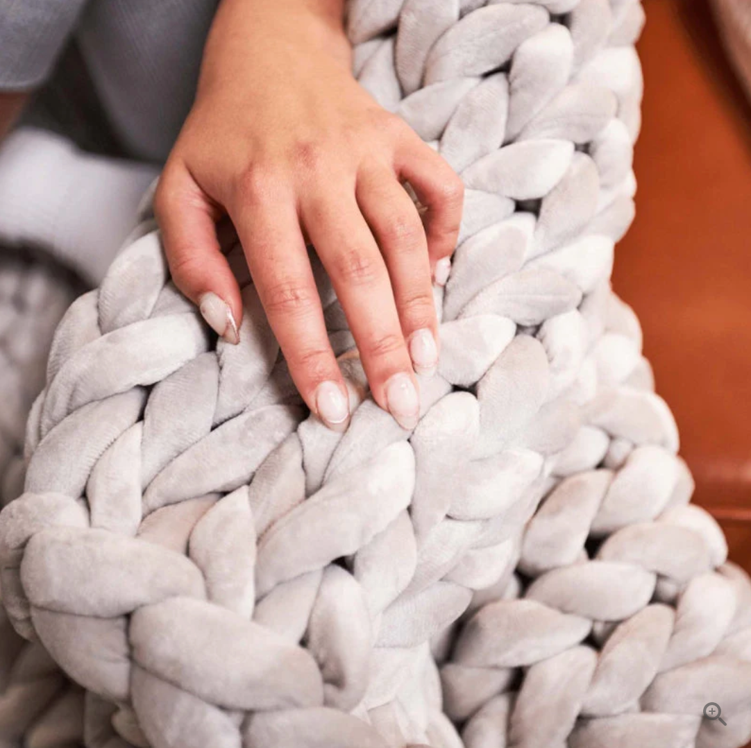 Gestrickte Decke aus Merinowolle – Wärme & Luxus