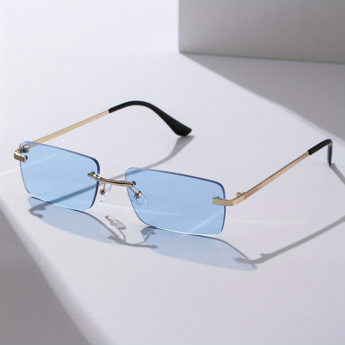 Herren-Sonnenbrille mit UV-Schutz und leichtem Metallgestell – rahmenlose Konstruktion