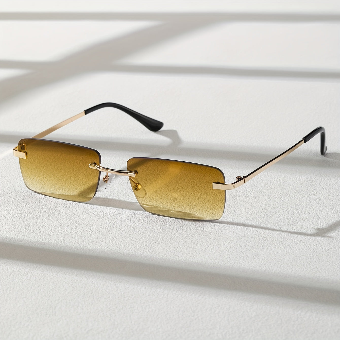 Herren-Sonnenbrille mit UV-Schutz und leichtem Metallgestell – rahmenlose Konstruktion