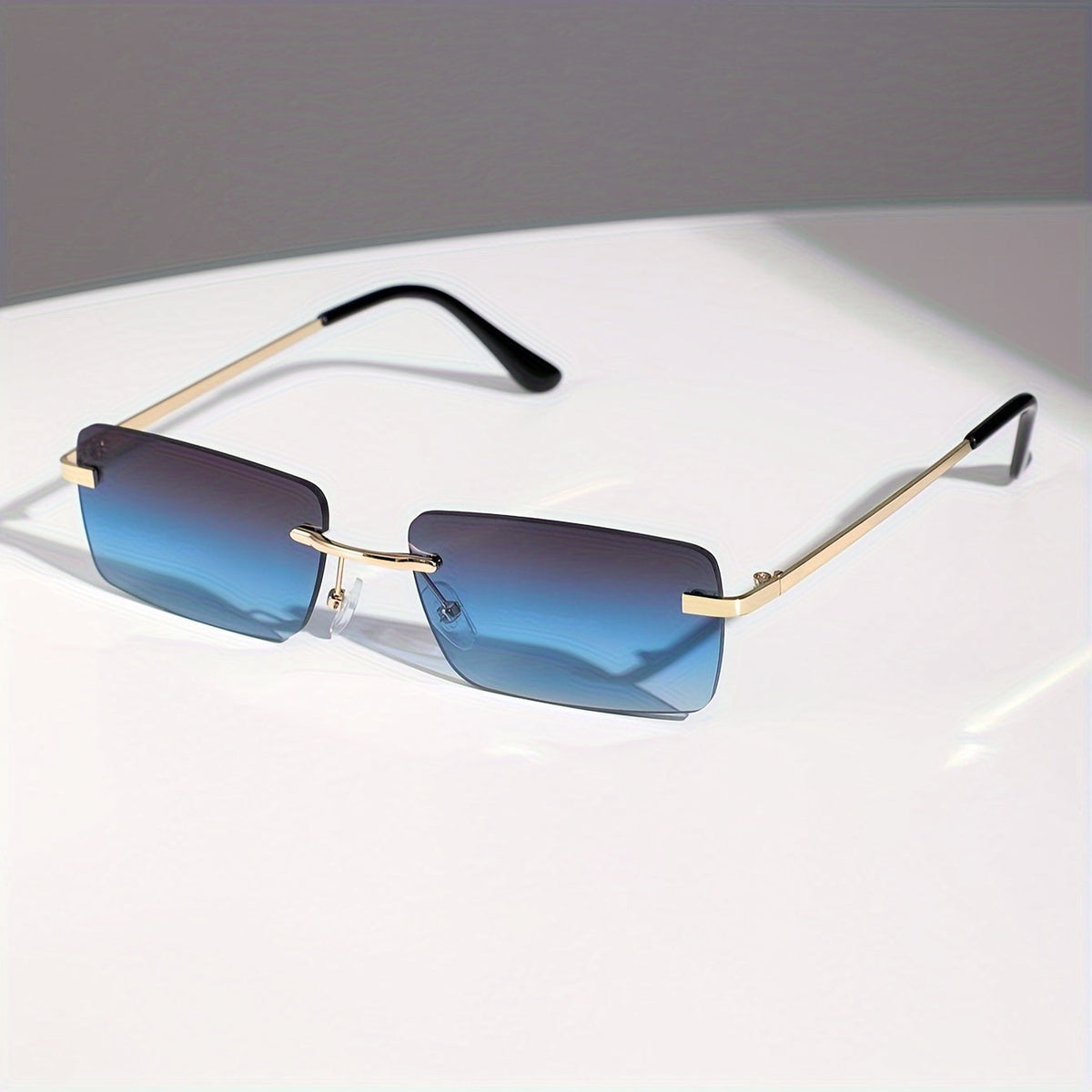 Herren-Sonnenbrille mit UV-Schutz und leichtem Metallgestell – rahmenlose Konstruktion