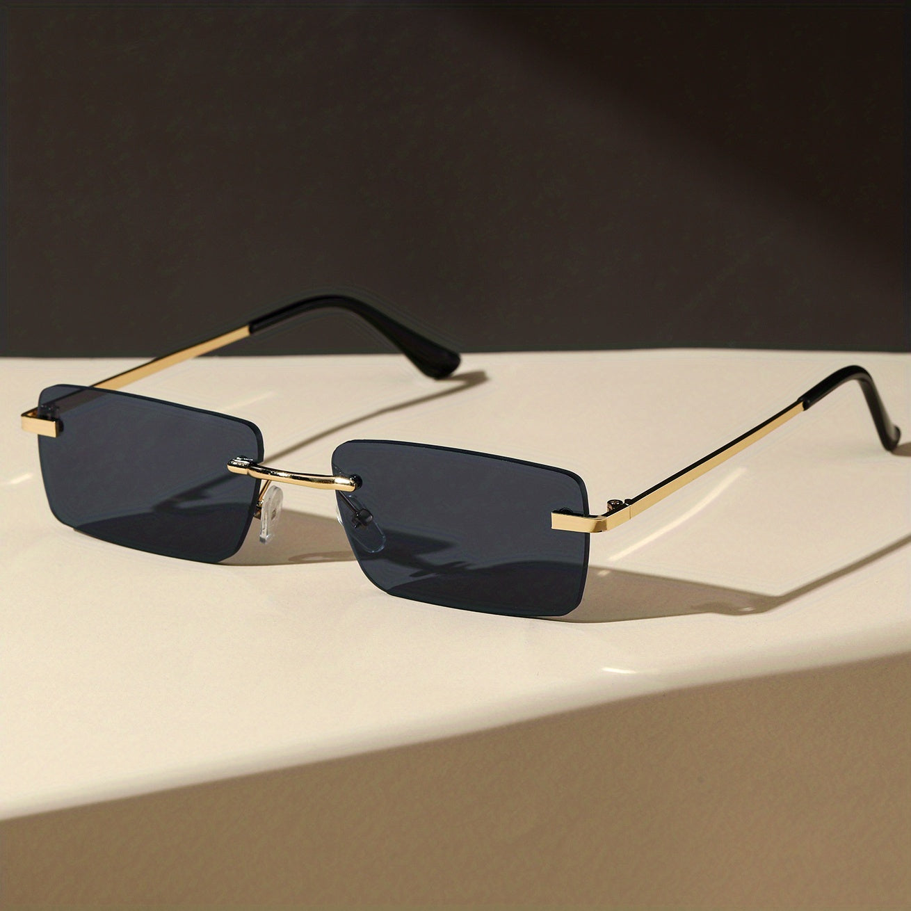 Herren-Sonnenbrille mit UV-Schutz und leichtem Metallgestell – rahmenlose Konstruktion