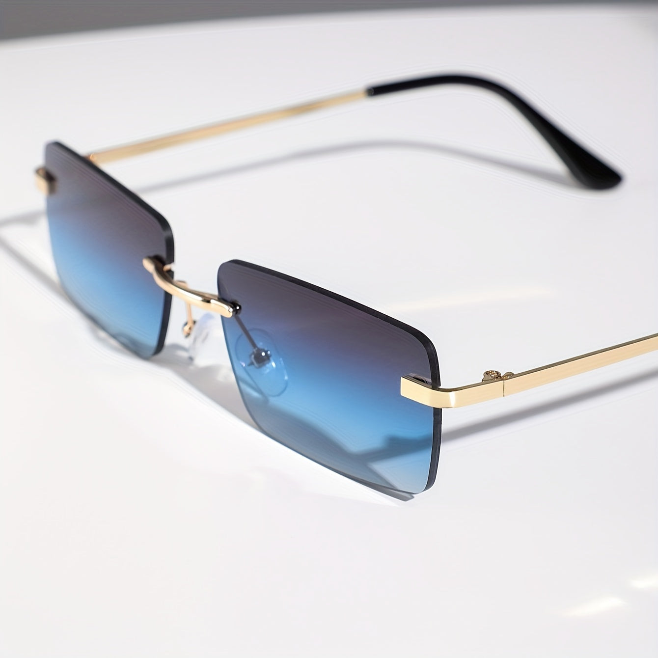 Herren-Sonnenbrille mit UV-Schutz und leichtem Metallgestell – rahmenlose Konstruktion
