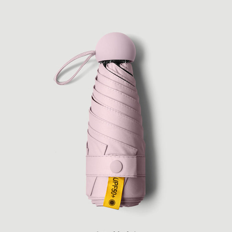 Kapsel-Taschenregenschirm mit UPF50+ UV-Schutz