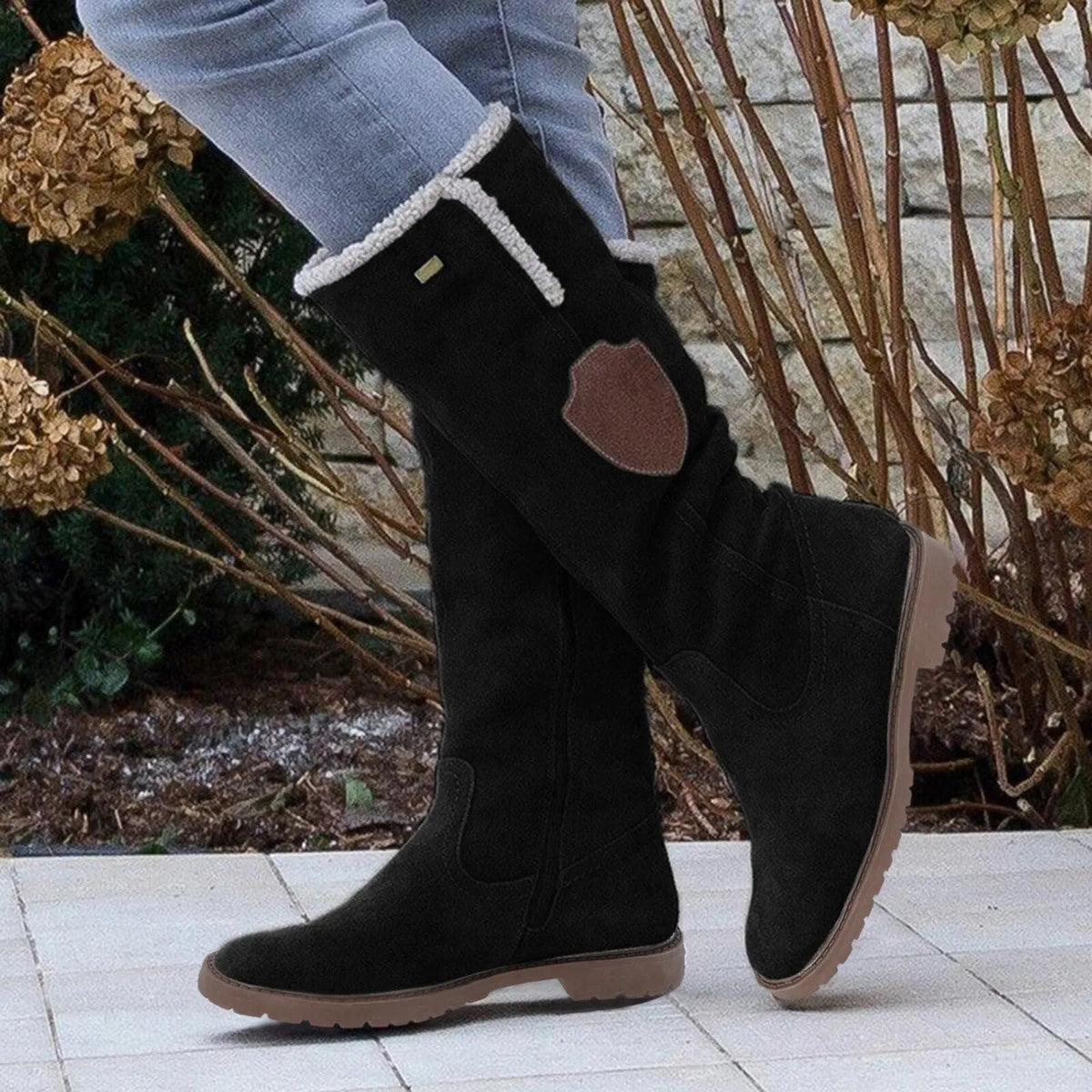 Kniehohe Damenstiefel mit Kunstfellbesatz
