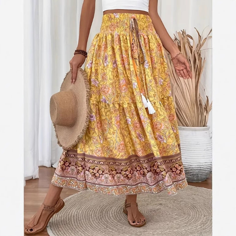 Langer Damen-Stufenrock aus Baumwollmischung im Boho-Stil mit Blumenmuster, elastischem Bund und Quasten