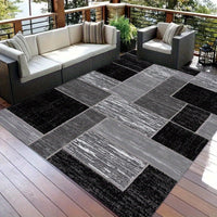 Outdoor-Teppich Coastal Grid | Moderner Terrassenteppich in Schwarz und Grau