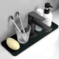Saugfähige Matte für den Wasserhahn