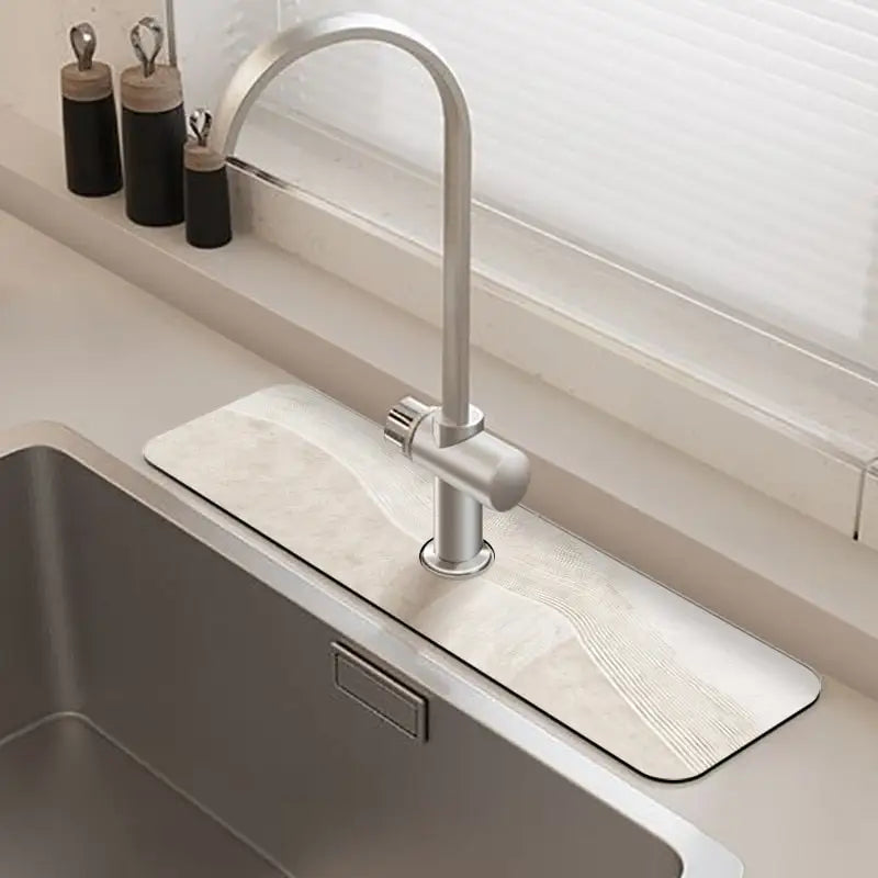 Saugfähige Matte für den Wasserhahn