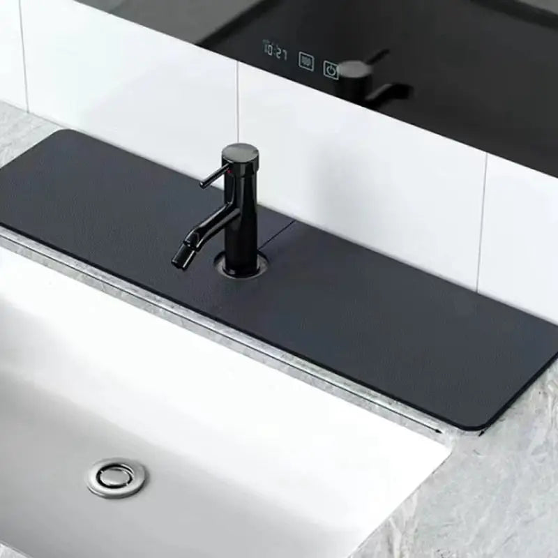Saugfähige Matte für den Wasserhahn