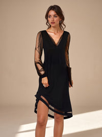 Schwarzes Damen-Partyminikleid für die Weihnachtsfeier mit transparenten langen Paillettenärmeln