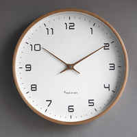 Skandinavische Wanduhr aus Holz – Eleganter Minimalismus
