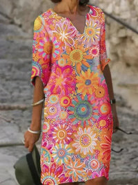Strahlendes Kleid mit Blumenmuster – lebendige und stilvolle Eleganz