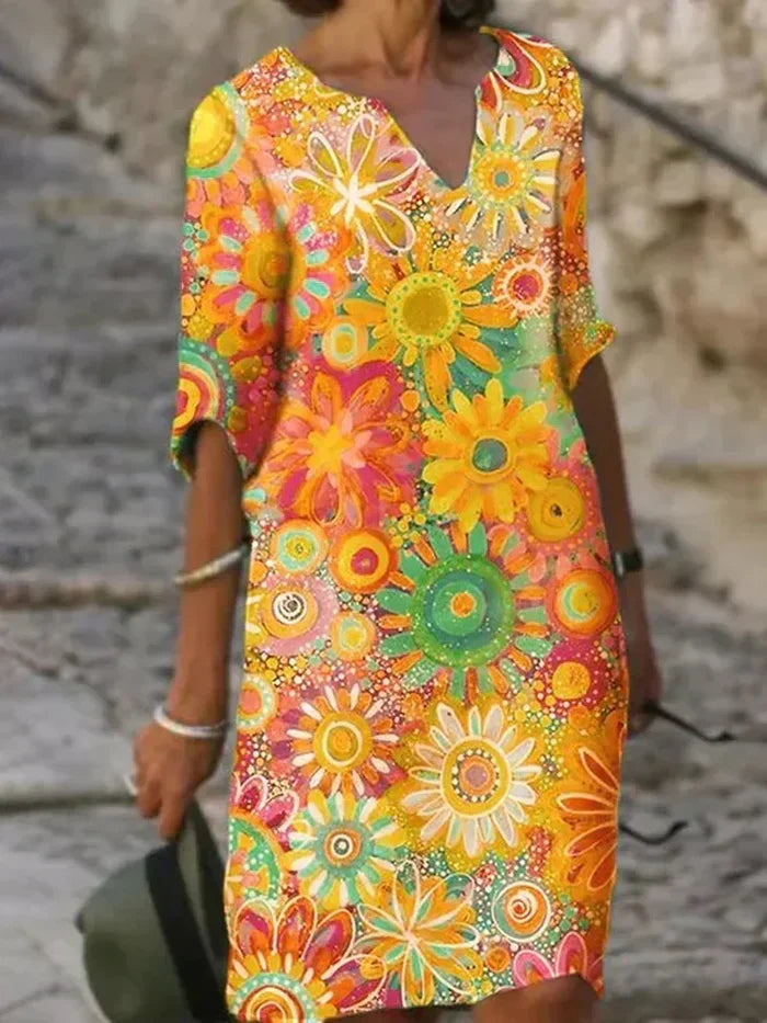 Strahlendes Kleid mit Blumenmuster – lebendige und stilvolle Eleganz