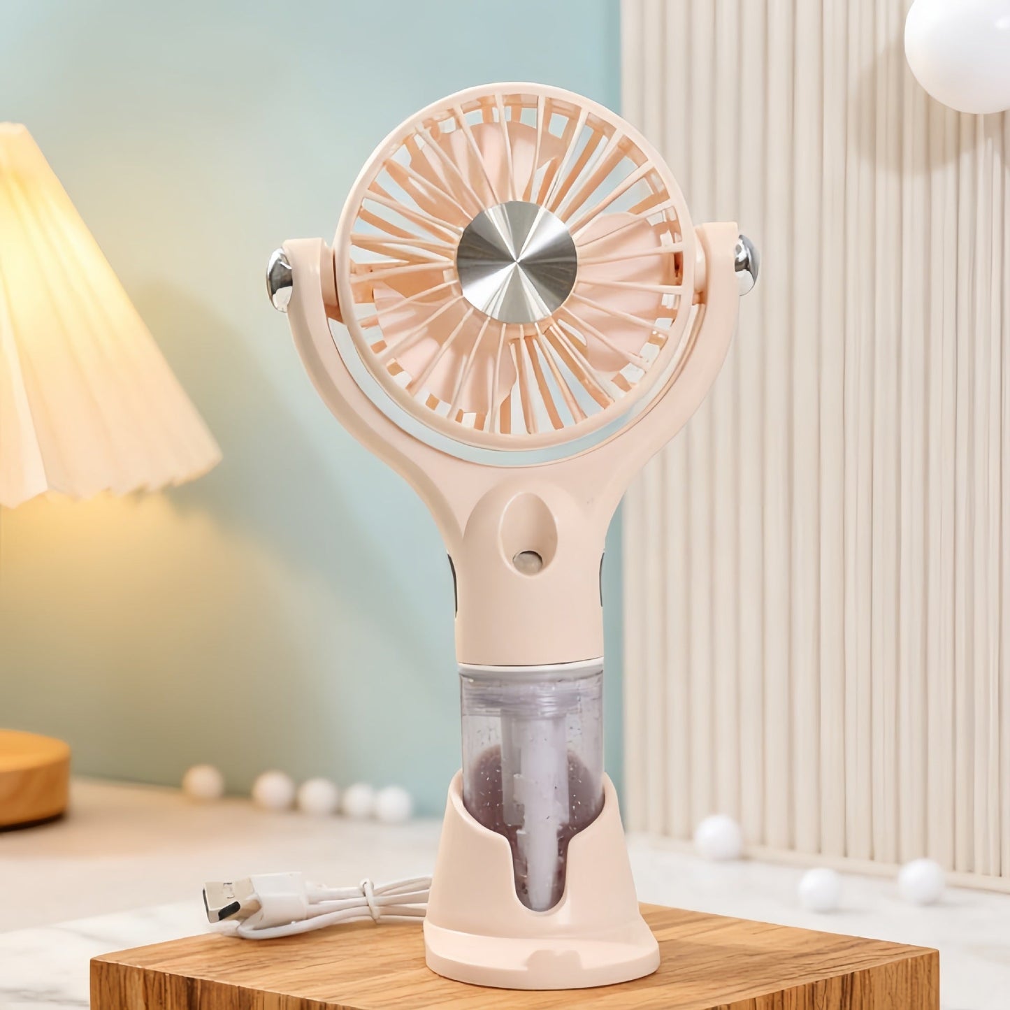 Tragbarer Unisex-Sprüh-Handventilator mit USB-Ladefunktion und ergonomischem Design