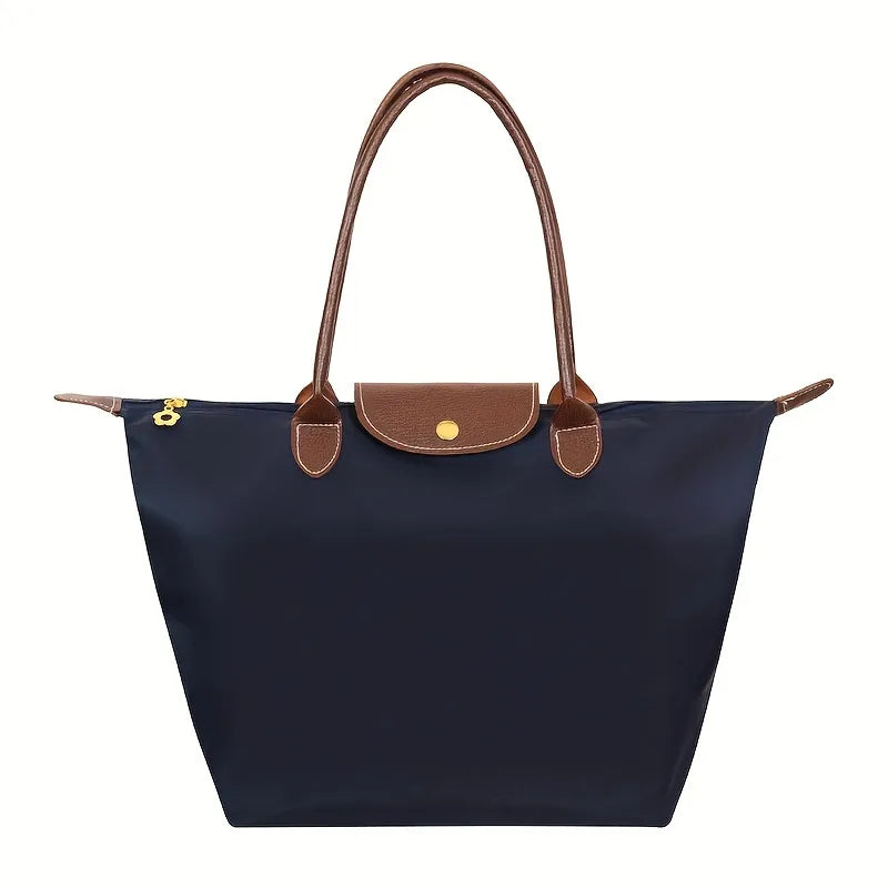 Vielseitige Handtasche aus Kunstleder mit eleganter Oberfläche