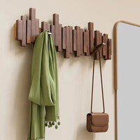 Wandhaken aus Holz im Klavier-Design