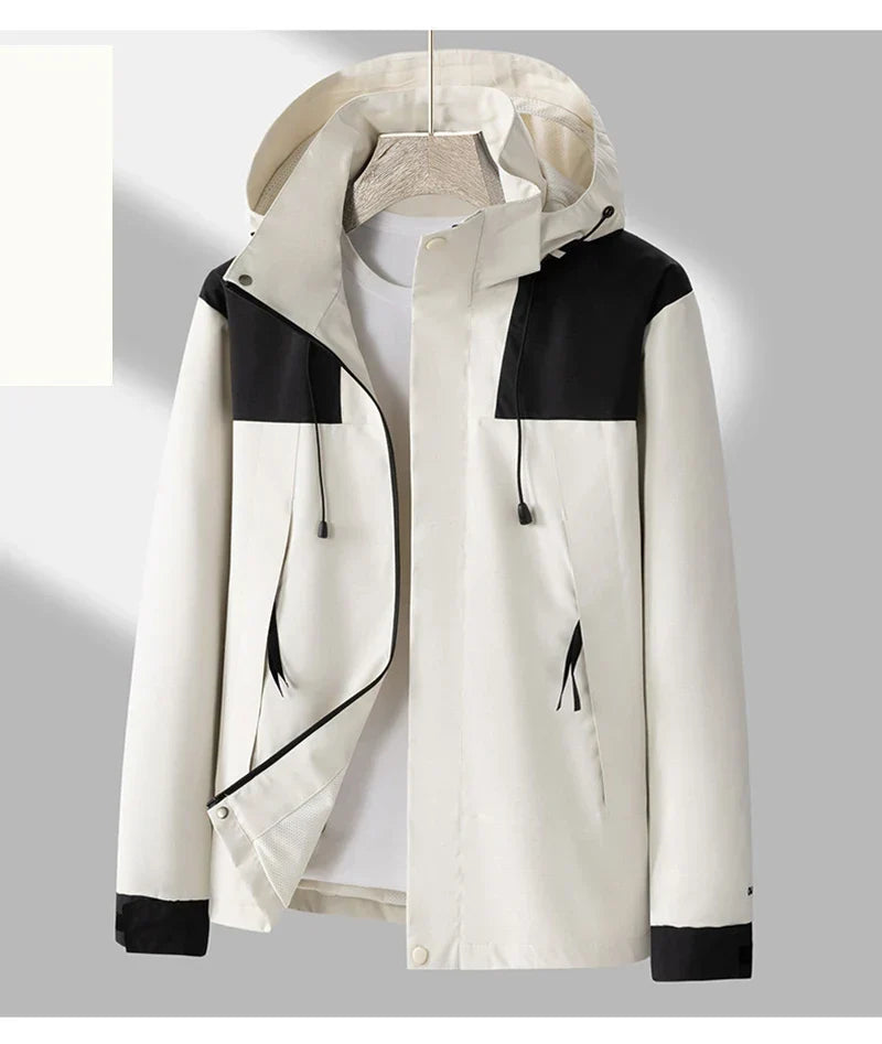 Wasserdichte und winddichte Unisex-Hardshelljacke mit abnehmbarer Kapuze